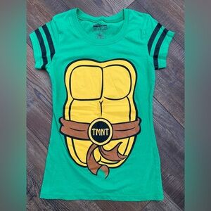 Women’s size small ninja turtle costume shirt with shell and cape.
